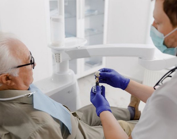 Dentist and patient talking during consultation