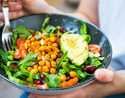 Closeup of salad in gray bowl